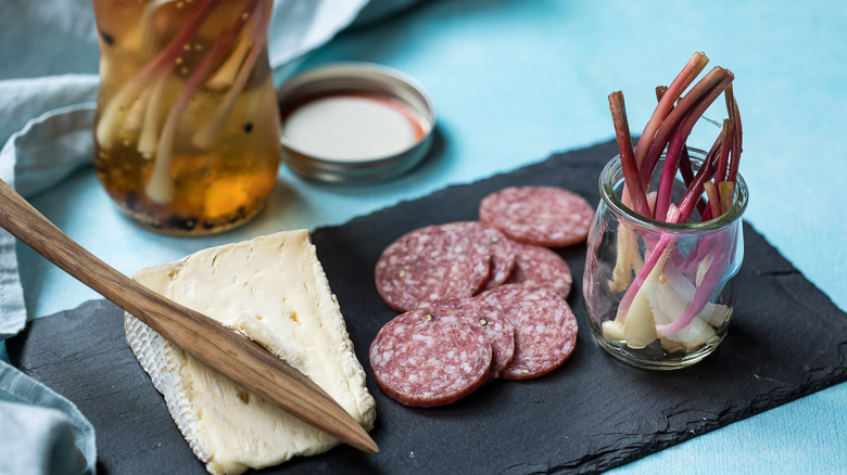 charcuterie board with pickled ramps