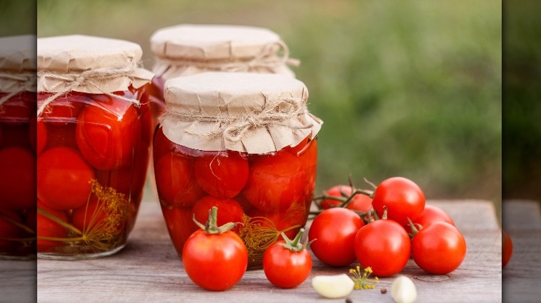 Pickled cherry tomatoes in jars