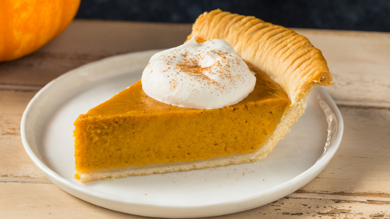 pumpkin pie slice whipped cream