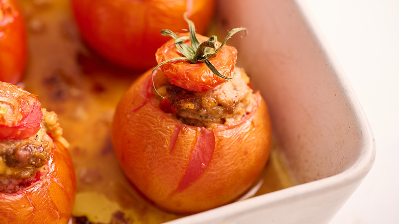 stuffed tomato in baking dish