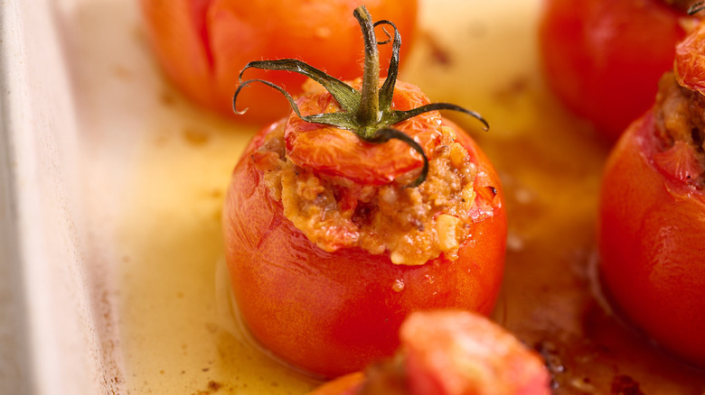 stuffed tomato in baking dish