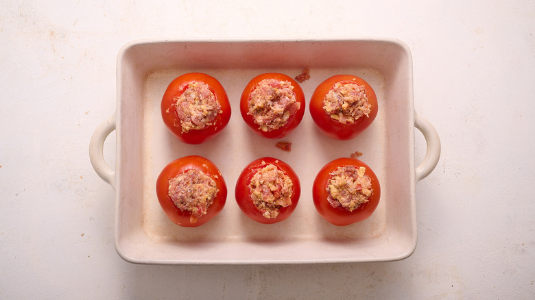 stuffed tomato in baking dish