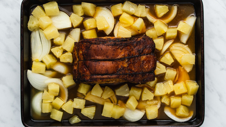 pineapple and pork on tray
