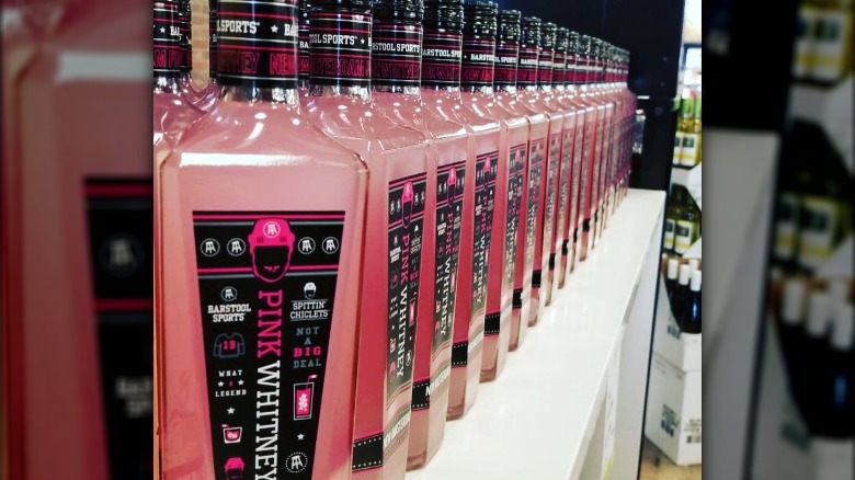 Bottles of Pink Whitney on shelf