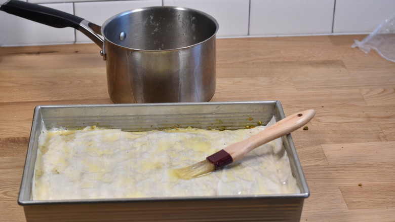 layering phyllo for baklava