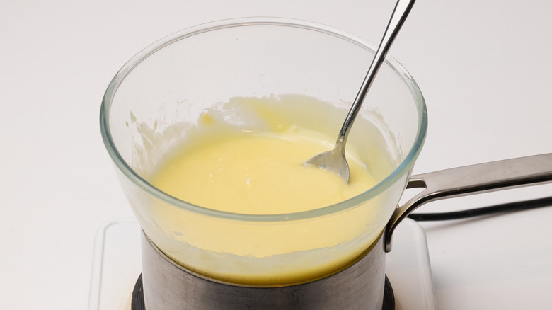 melted white chocolate in bowl