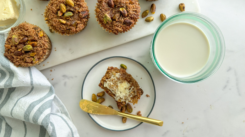 muffin with butter on plate