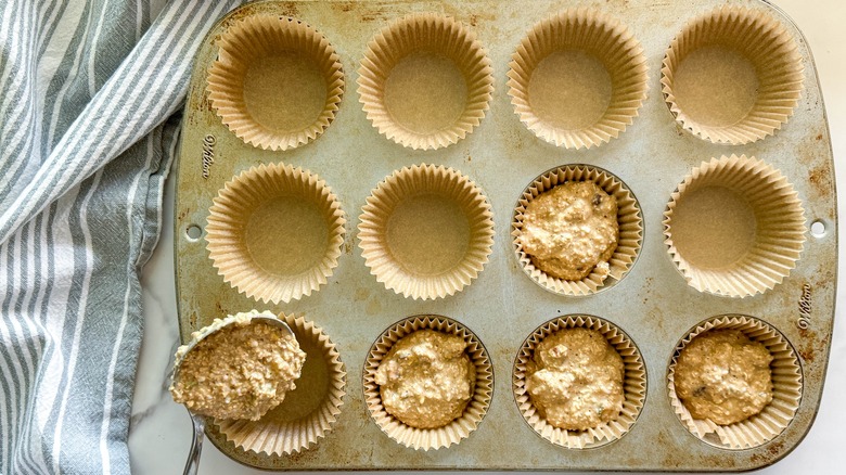 spoon filling muffin tin