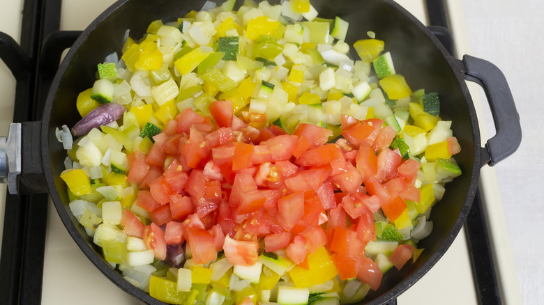 Preparing Spanish pisto in skillet