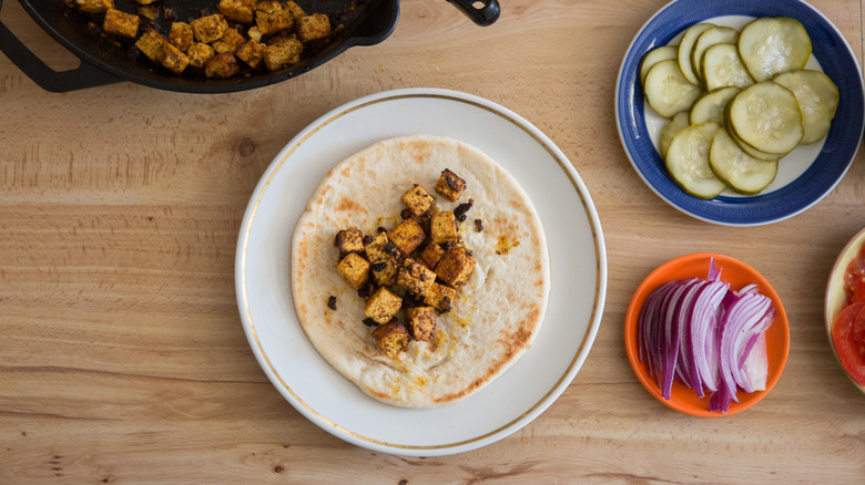 marinated tofu on open pita 