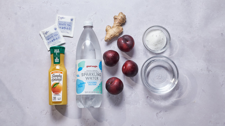 plum ginger drink ingredients on a table