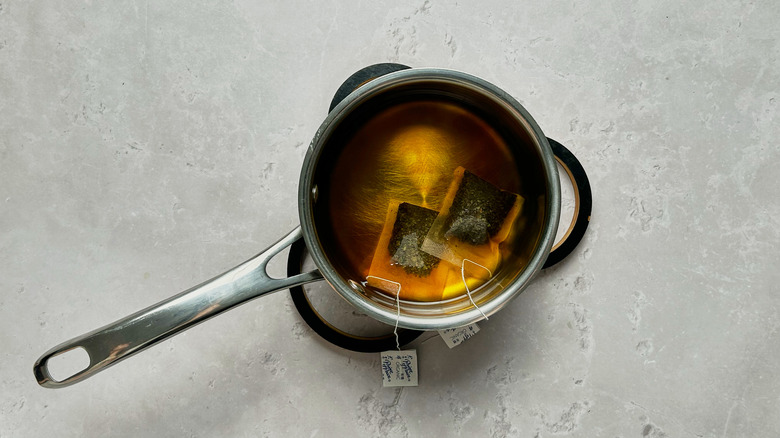 steeping tea in saucepan