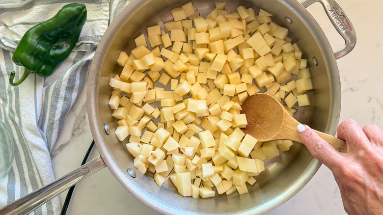 chopped potatoes in pan