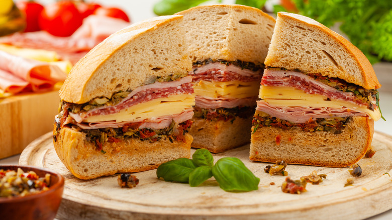 Muffuletta sandwich on cutting board