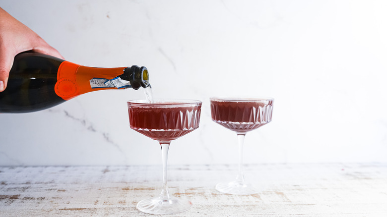 Pouring prosecco into glass