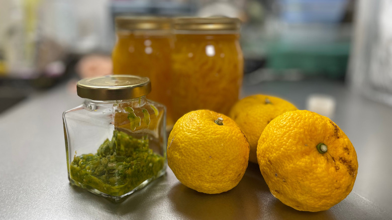 Yuzu fruit in a kitchen with jars