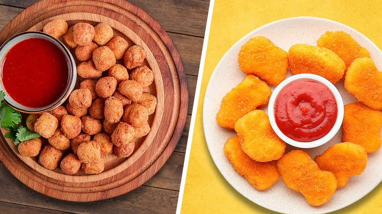 Popcorn chicken and chicken nuggets on separate dishes with dipping sauces
