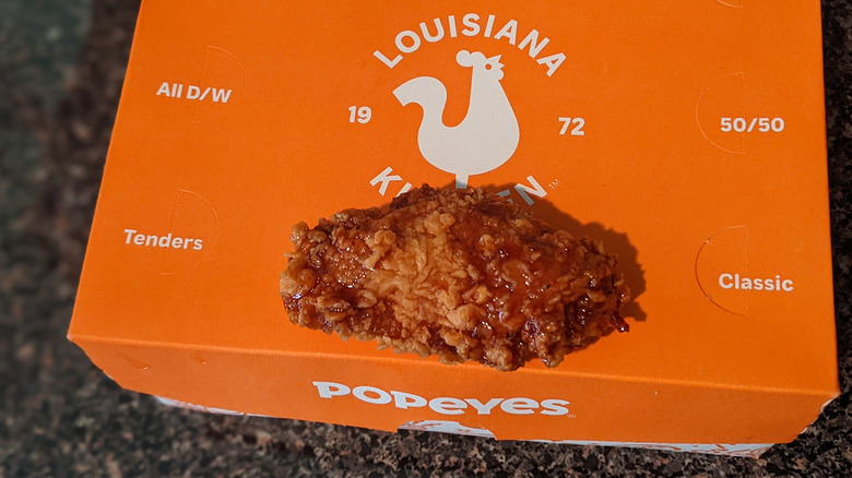 Popeyes wing on box