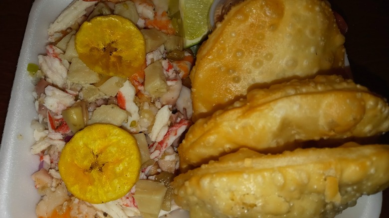 arepas de coco with seafood salad