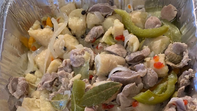 pan of pickled bananas and chicken gizzards