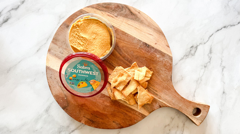 Southwest hummus on table with chips