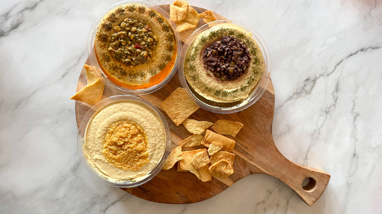 Sabra hummus and chips on board