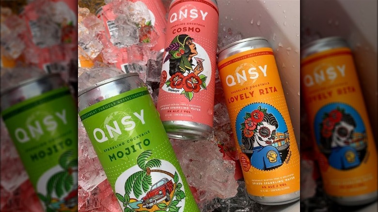 cans of QNSY cocktails 