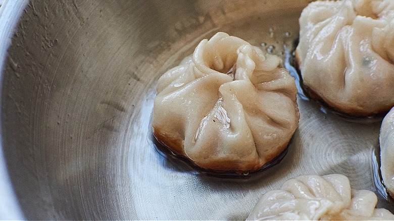 browned dumpling in skillet