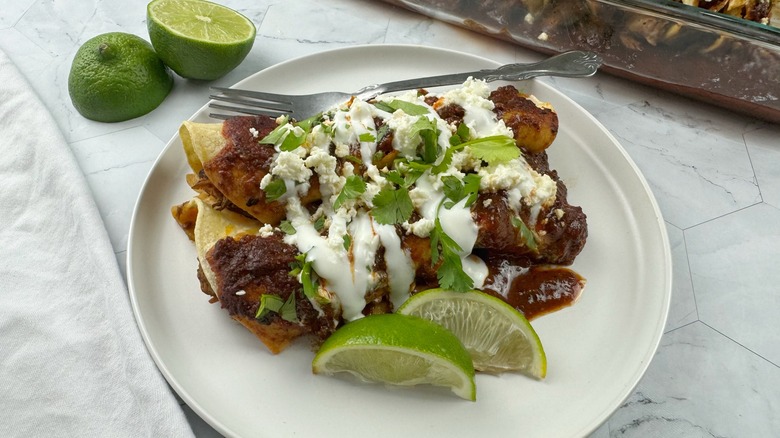 enchiladas on white plate