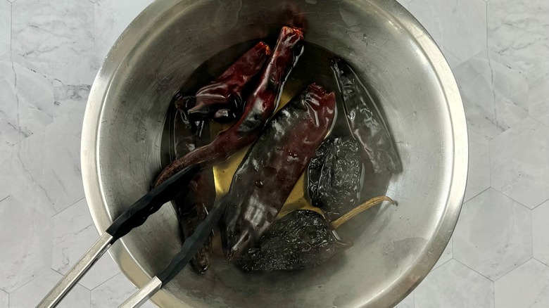 dried chiles in water