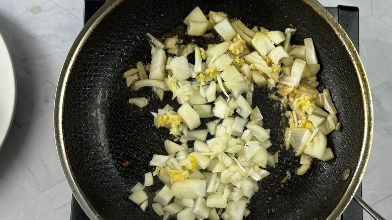 onions and garlic in pan