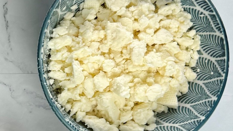 cotija cheese in patterned bowl