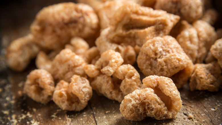 Pork rinds on cutting board 