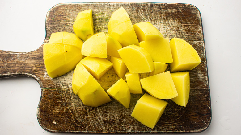 diced potatoes on cutting board