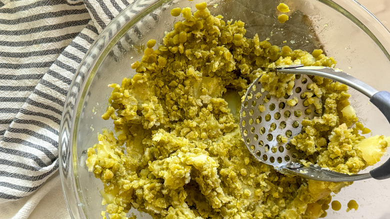 mashed potatoes and peas in bowl