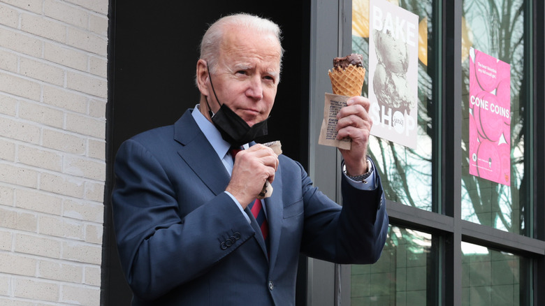 President Biden exiting an ice cream parlour with a cone