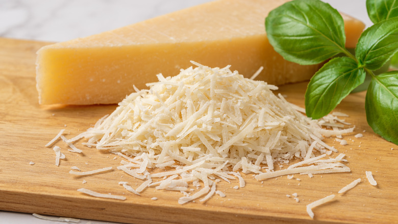 Wedge of Parmesan and grated cheese