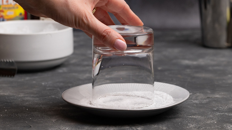 dipping rocks glass in salt