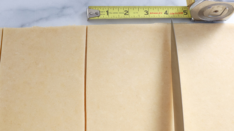 sliced dough with measuring tape