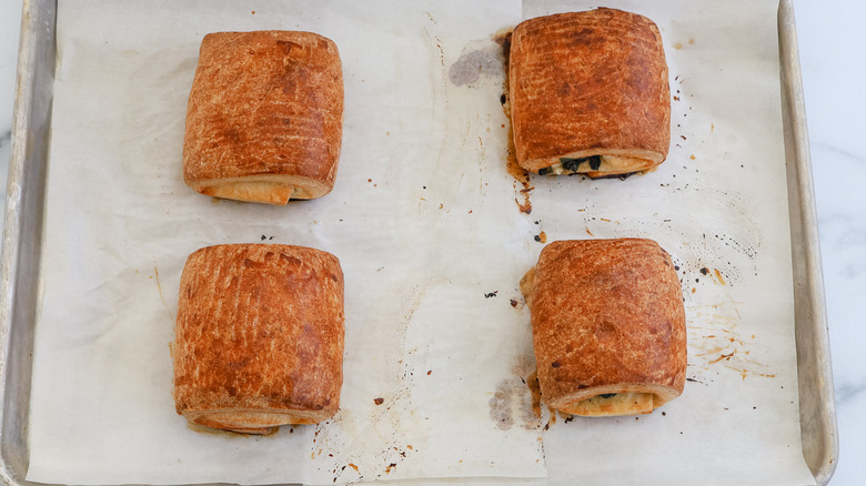 baked croissants on baking sheet