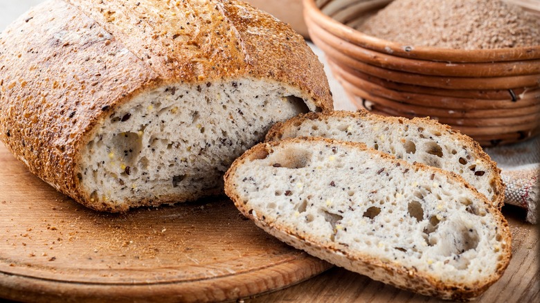 Slices of seeded bread and loaf