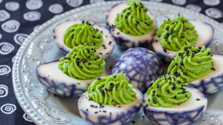 halloween themed spiderweb deviled eggs