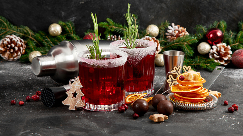 cranberry Christmas cocktails with rosemary sprigs