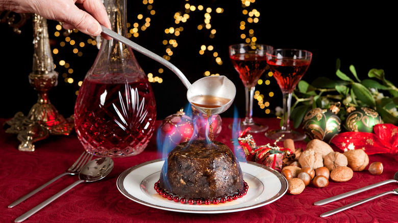 Flaming brandy over Christmas pudding