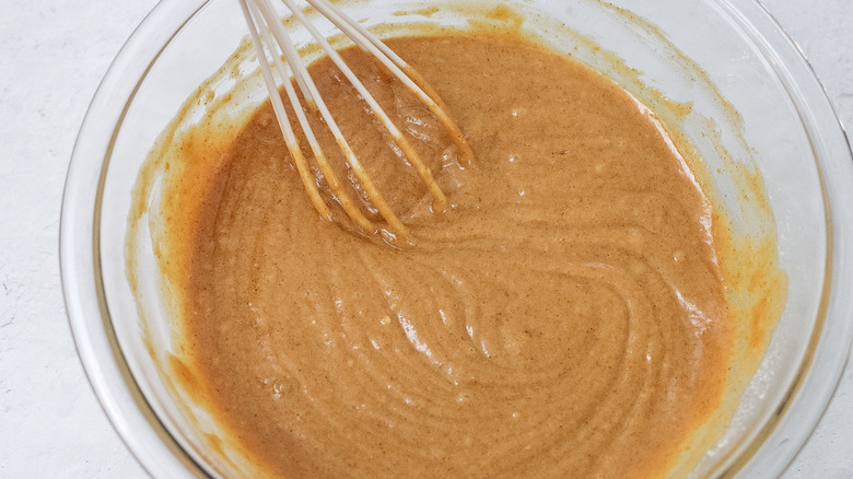 pumpkin cake batter in bowl