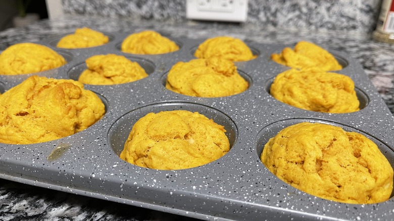 pumpkin donuts in muffin tin