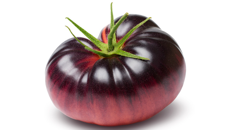 whole purple tomato