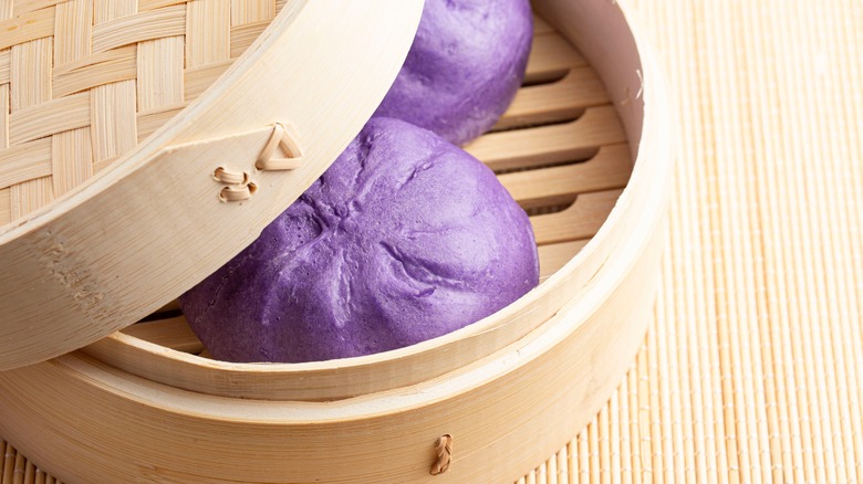 Purple sweet potato dumplings in steamer basket