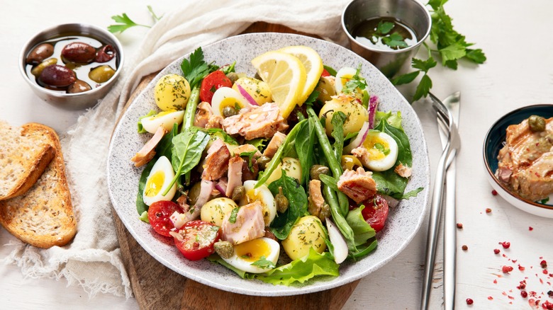 Bowl of Niçoise salad with olives