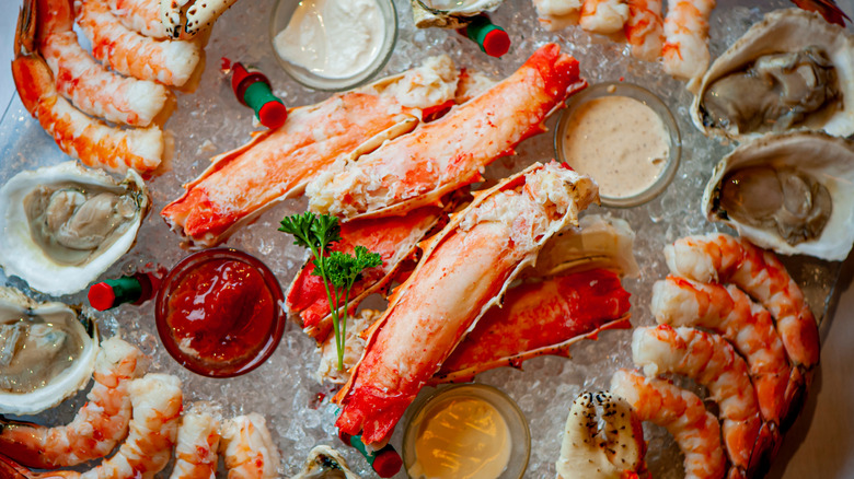 a shellfish platter with tabasco sauce